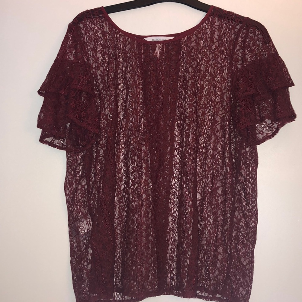 Lace, sultry open back shirt